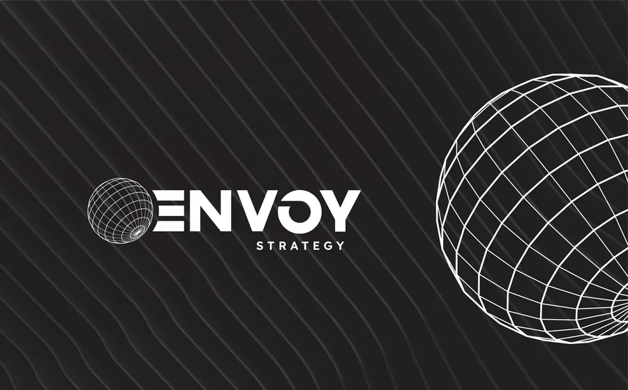 A Revision 03 logo option on a dark textured board: a wireframe globe beside ENVOY in capitals, with a large globe on the right.
