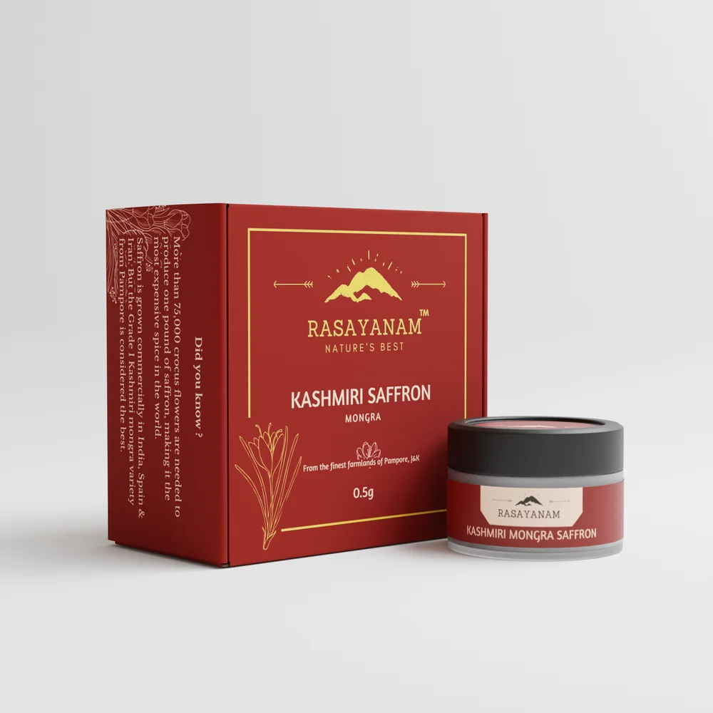 3D render of the Kashmiri Saffron 0.5g packaging: a red box with a gold border, the mountain logo and a saffron-flower line drawing, beside a jar with a red label.